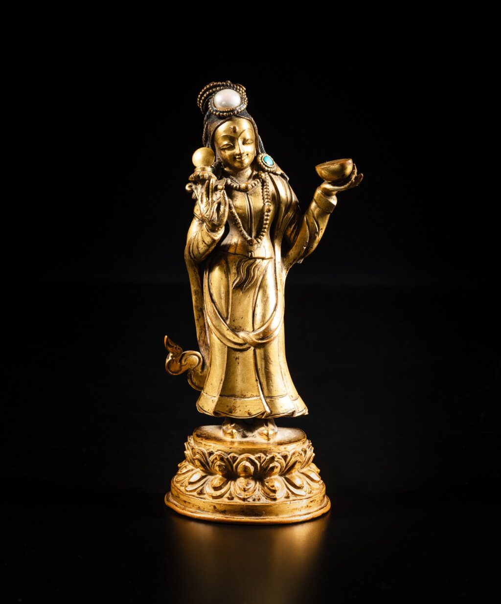 View full screen - View 1 of Lot 7. A rare inscribed gilt-copper figure of Yeshe Tsogyal, Tibet, 17th / 18th century | 十七 / 十八世紀 藏傳銅鎏金益西措嘉立像.