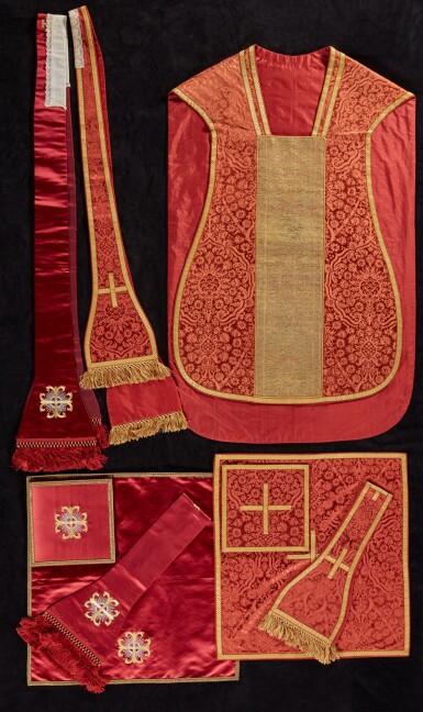 View full screen - View 1 of Lot 235. A dark salmon silk lampas chasuble with woven orphrey, with matching and other later complementary accessories, Italian, 16th century and later.