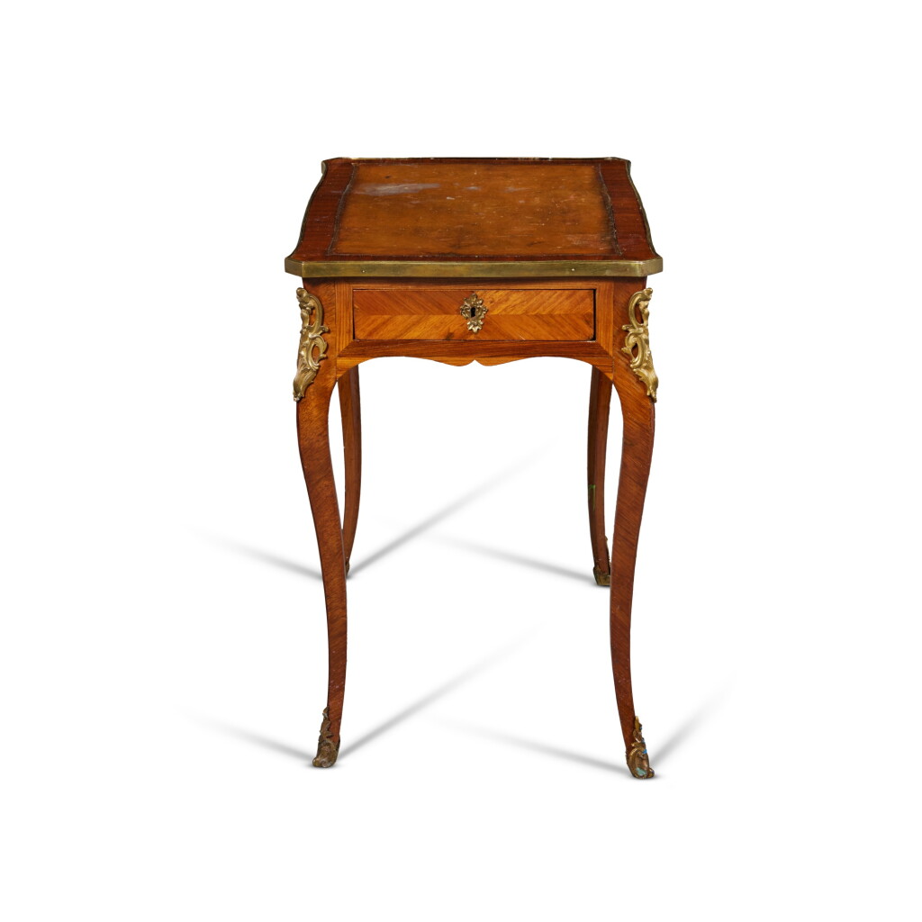 View full screen - View 1 of Lot 338. A Louis XV Style Gilt-Bronze Mounted Tulipwood Table à Écrire.