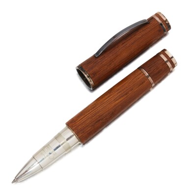 View full screen - View 1 of Lot 61. OMAS | A LIMITED EDITION OAK AND STERLING PLATED ROLLERBALL PEN, CIRCA 2000.