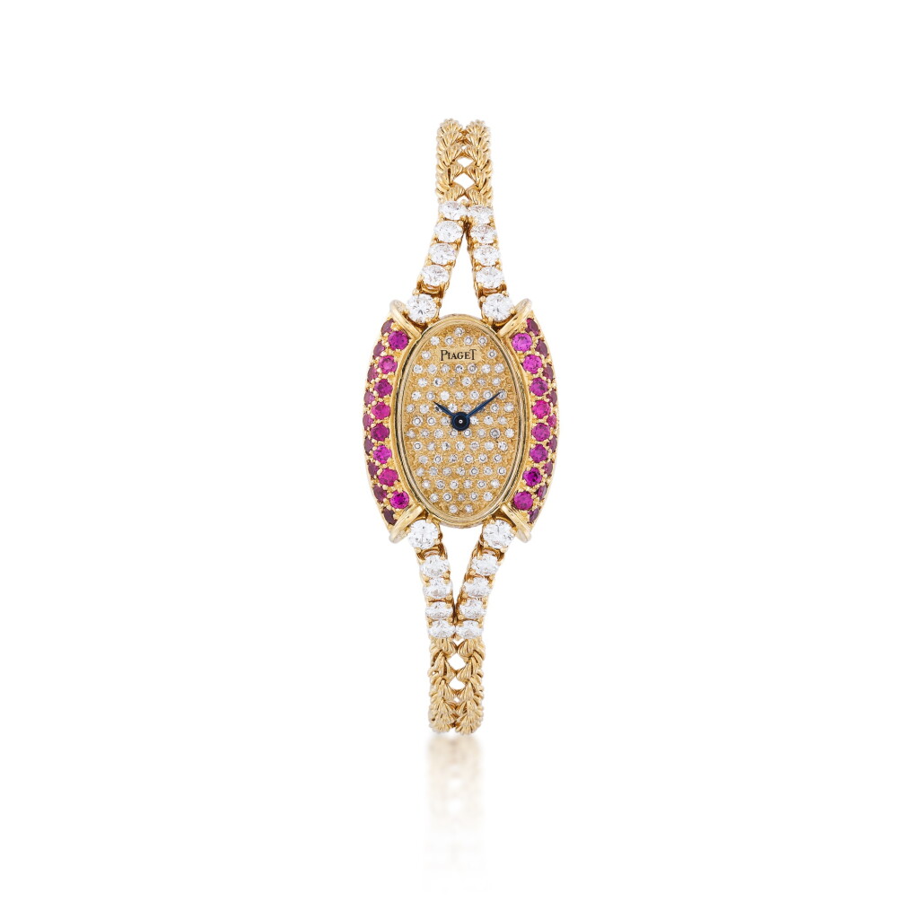 View full screen - View 1 of Lot 140. Montre bracelet de dame or, rubis et diamant | Lady's gold, ruby and diamond bracelet watch.