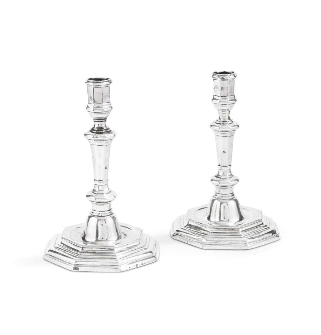 View full screen - View 1 of Lot 506. A pair of silver candlesticks, France, province, circa 1730 | Paire de flambeaux en argent, France, province, vers 1730.