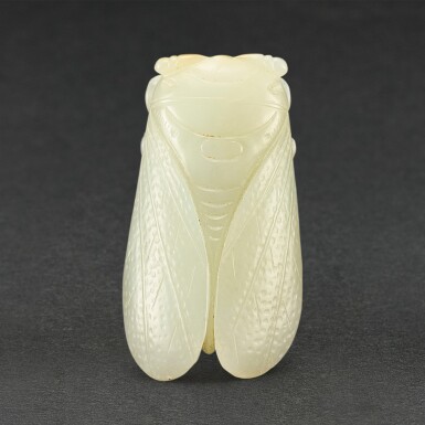 View full screen - View 1 of Lot 565. A WHITE JADE FIGURE OF A CICADA QING DYNASTY | 清 白玉蟬.