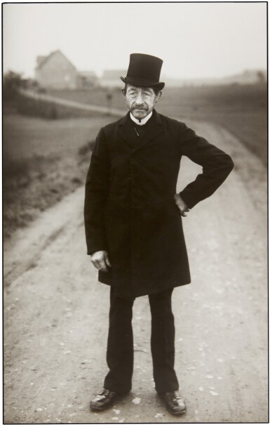 View full screen - View 1 of Lot 28. AUGUST SANDER | FARMER ON HIS WAY TO CHURCH.
