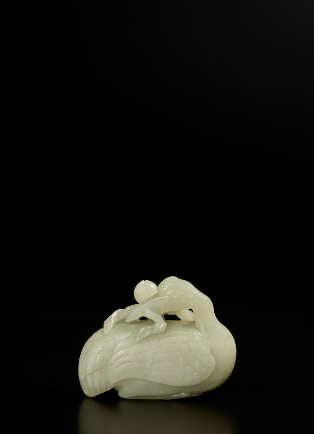 View full screen - View 1 of Lot 843. A celadon jade 'crane and peach' group, Qing dynasty, 18th century | 清十八世紀 青玉雕鶴壽延年把件.