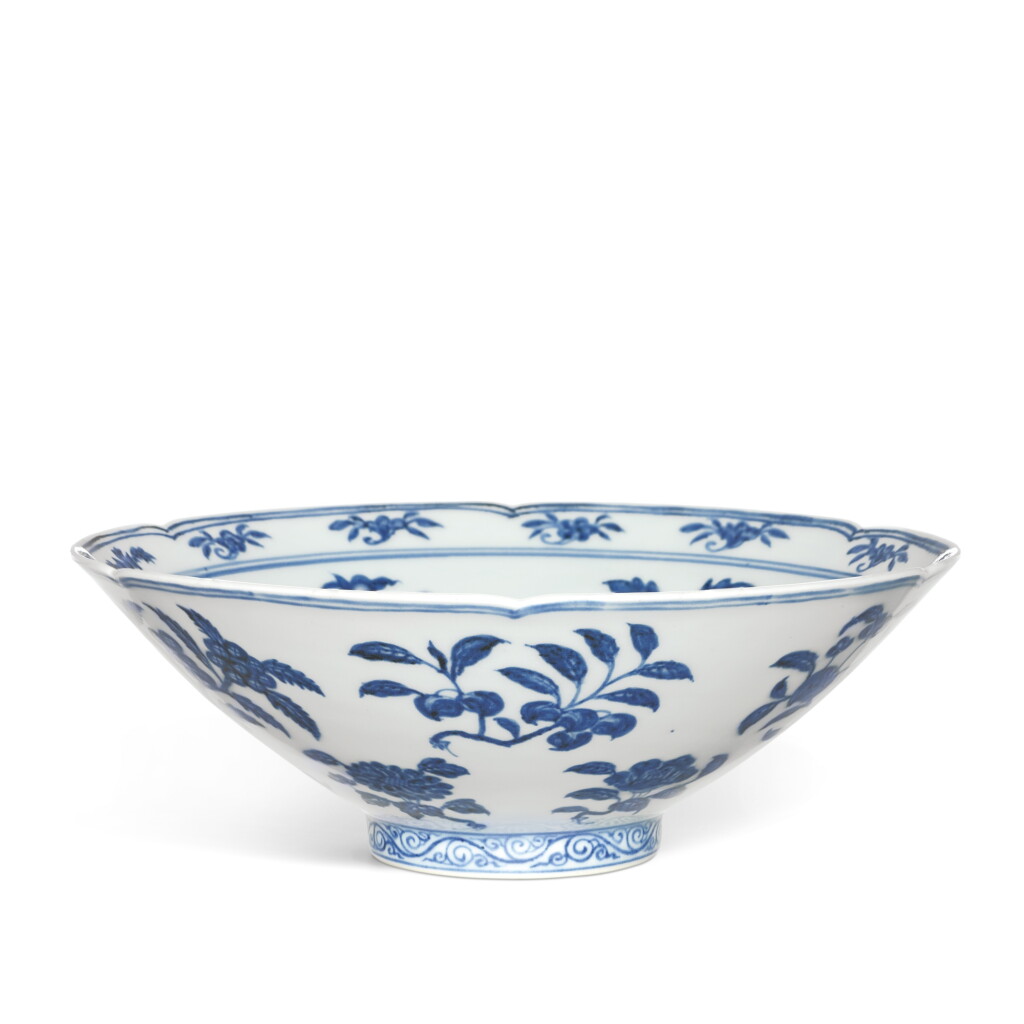 View full screen - View 1 of Lot 3692. A fine and rare blue and white lobed 'fruit and flower' bowl, Mark and period of Xuande | 明宣德 青花折枝花果紋葵式盌 《大明宣德年製》款.
