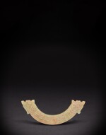 A jade 'dragon' pendant, huang, Western Zhou dynasty | 西周 龍紋玉璜