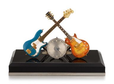 View full screen - View 1 of Lot 211. ASPREY | A WHITE GOLD AND ENAMEL PENHOLDER WITH TIMEPIECE, GUITAR MOTIF AND ONYX BASE, CIRCA 1980.
