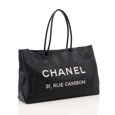 View full screen - View 1 of Lot 176. Small black leather '31 Rue Cambon' tote bag.