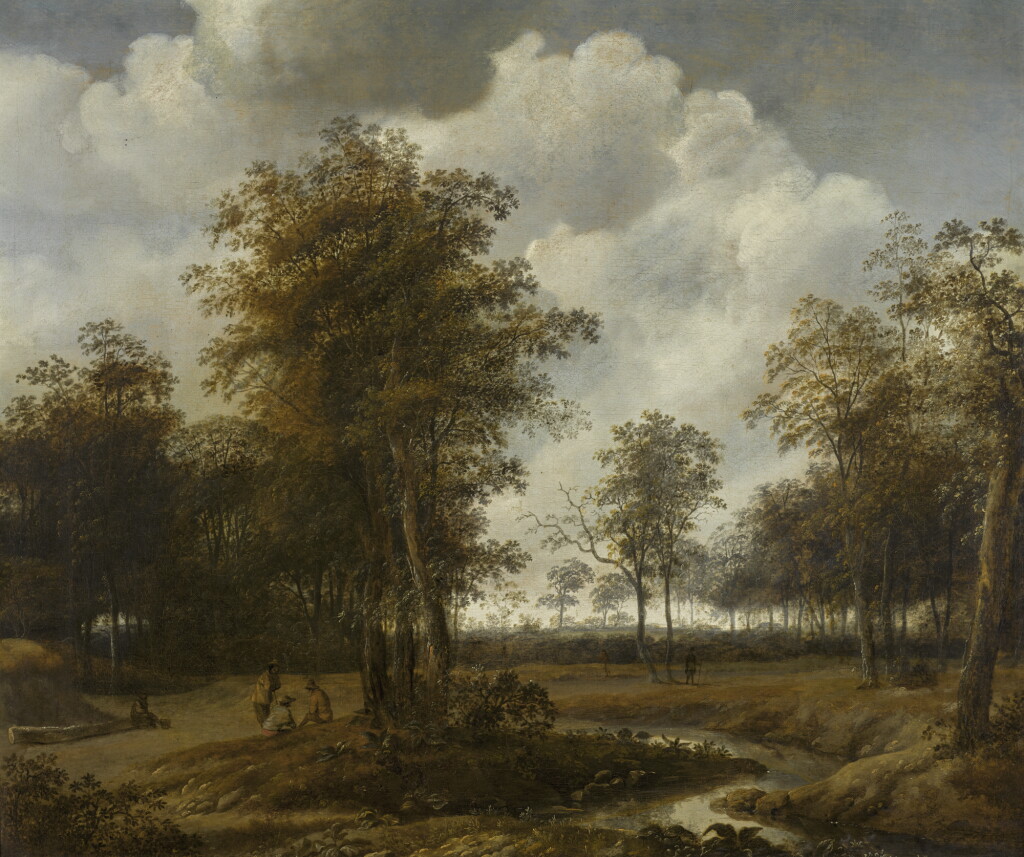 View full screen - View 1 of Lot 102. JAN LAGOOR | A wooded river landscape with figures resting at the side of a path.