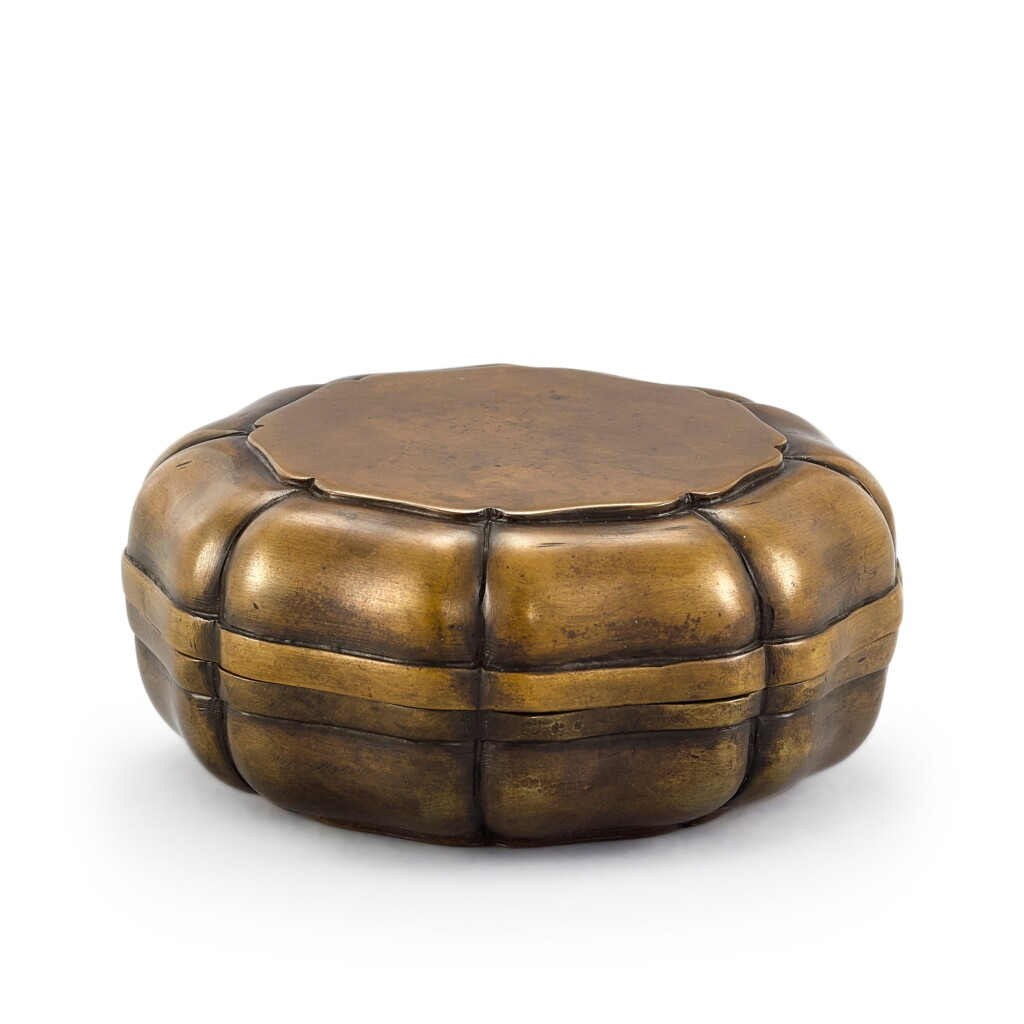 View full screen - View 1 of Lot 733. A BRONZE MALLOW-FORM BOX AND COVER QING DYNASTY | 清 銅蓮花式蓋盒 《天地一家春》銘款.