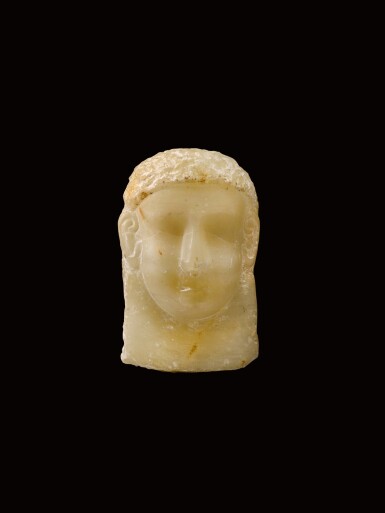 View full screen - View 1 of Lot 119. A South Arabian Alabaster Relief Head of a Man, Qataban, 3rd Century B.C./1st Century A.D..