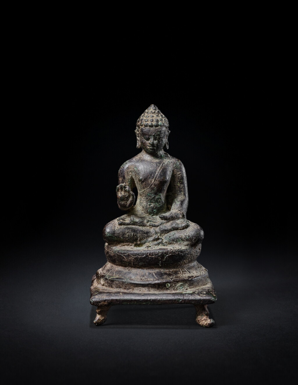View full screen - View 1 of Lot 7. A bronze figure of Vairochana Buddha, Java, 9th century.
