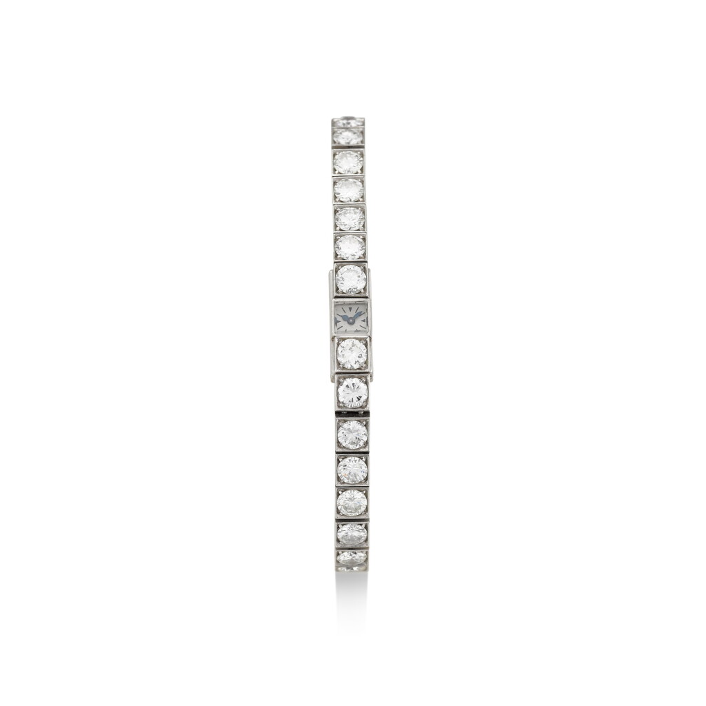 View full screen - View 1 of Lot 8187. JAEGER-LECOULTRE | A PLATINUM DIAMOND-SET BRACELET WATCH, CIRCA 1940.