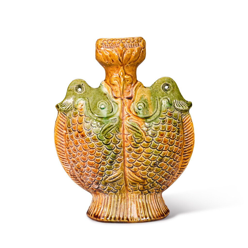 View full screen - View 1 of Lot 880. A sancai-glazed pottery 'twin-fish' flask, Tang dynasty.