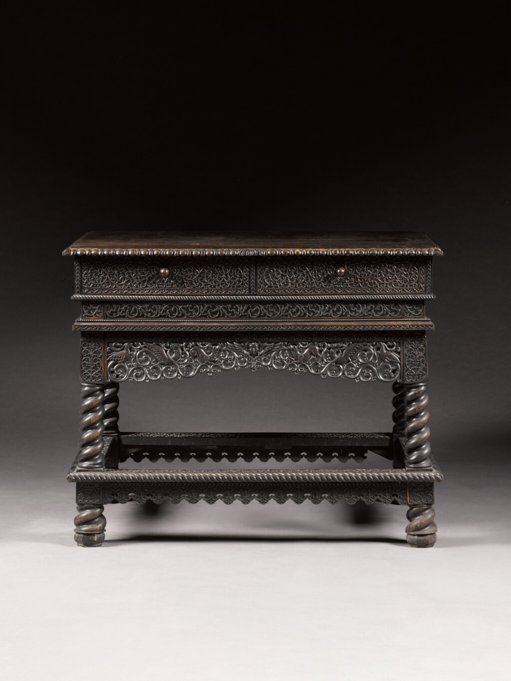 View full screen - View 1 of Lot 57. An Indo-Dutch ebony side table, India, Coromandel coast, circa 1660-80.