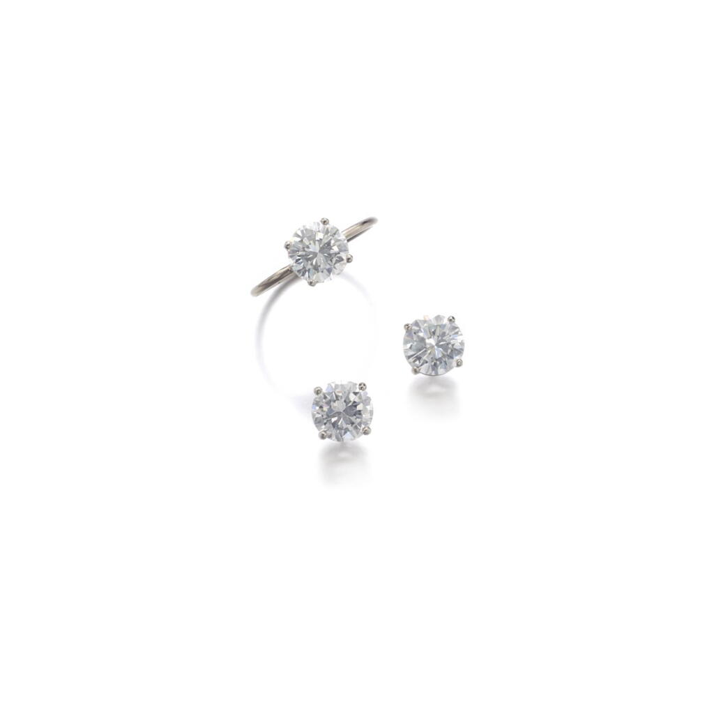 View full screen - View 1 of Lot 309. PAIR OF DIAMOND EARRINGS AND A RING.