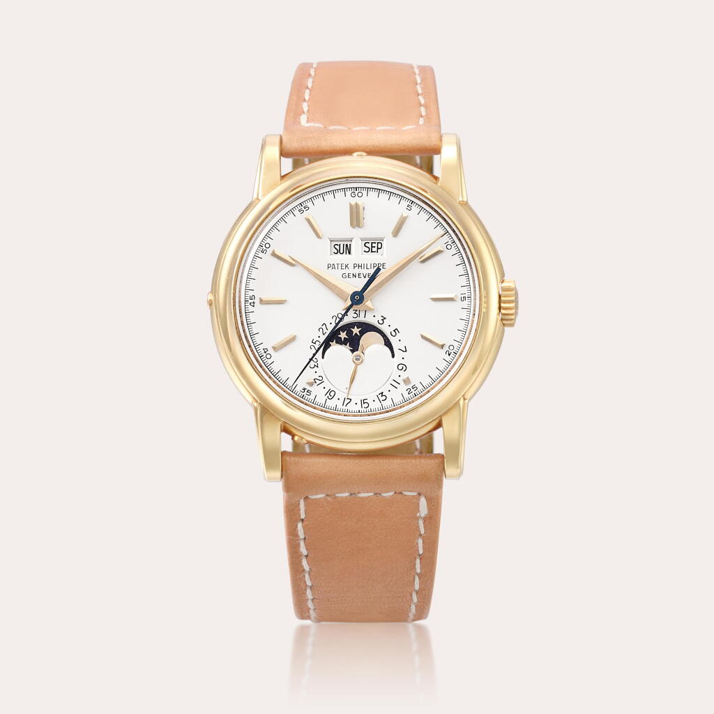 View full screen - View 1 of Lot 2256. Reference 2438/1 | A yellow gold perpetual calendar wristwatch with moon phases, sweep centre seconds, screw down case back and Wenger case, Made in 1954.