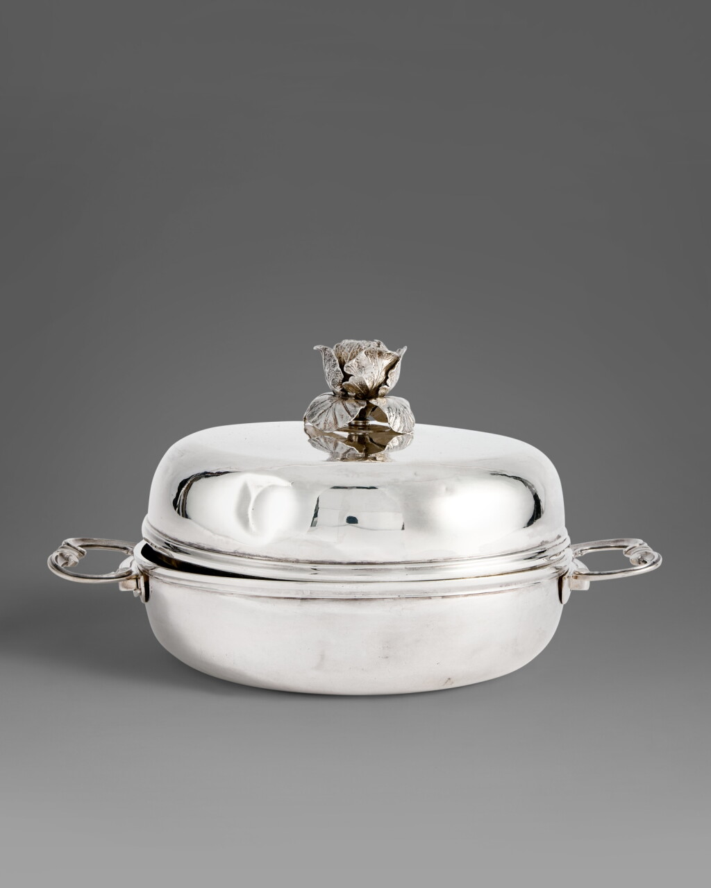 View full screen - View 1 of Lot 552. A Louis XV Silver Travelling Vegetable Dish and Cover, Pierre-Ignace Thiebaud II, Salins, 1775.