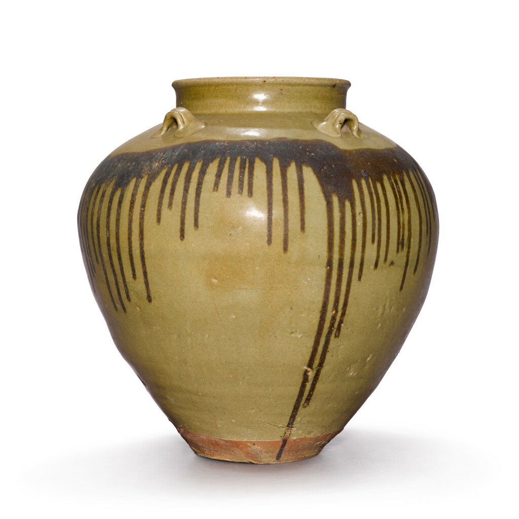 View full screen - View 1 of Lot 44. A large brown and celadon-glazed pottery jar, Late Tang dynasty / Five Dynasties .