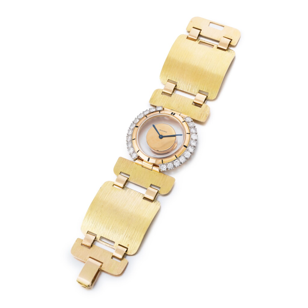 View full screen - View 1 of Lot 201. Montre bracelet de dame or et diamants, "Mystérieuse" | Lady's gold and diamond bracelet watch, 'Mystérieuse'.