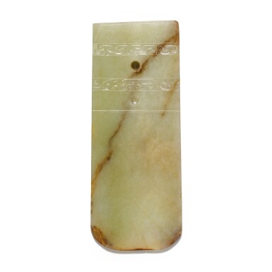 View full screen - View 1 of Lot 26. An archaistic celadon and russet jade blade Qing dynasty, 17th/18th century | 清十七/十八世紀 褐斑青玉仿古玉鏟.