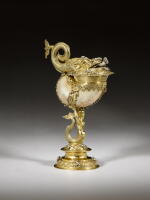 A German parcel-gilt silver-mounted turbo shell cup and cover, Straubing, circa 1600, maker's mark a fleur-de-lis