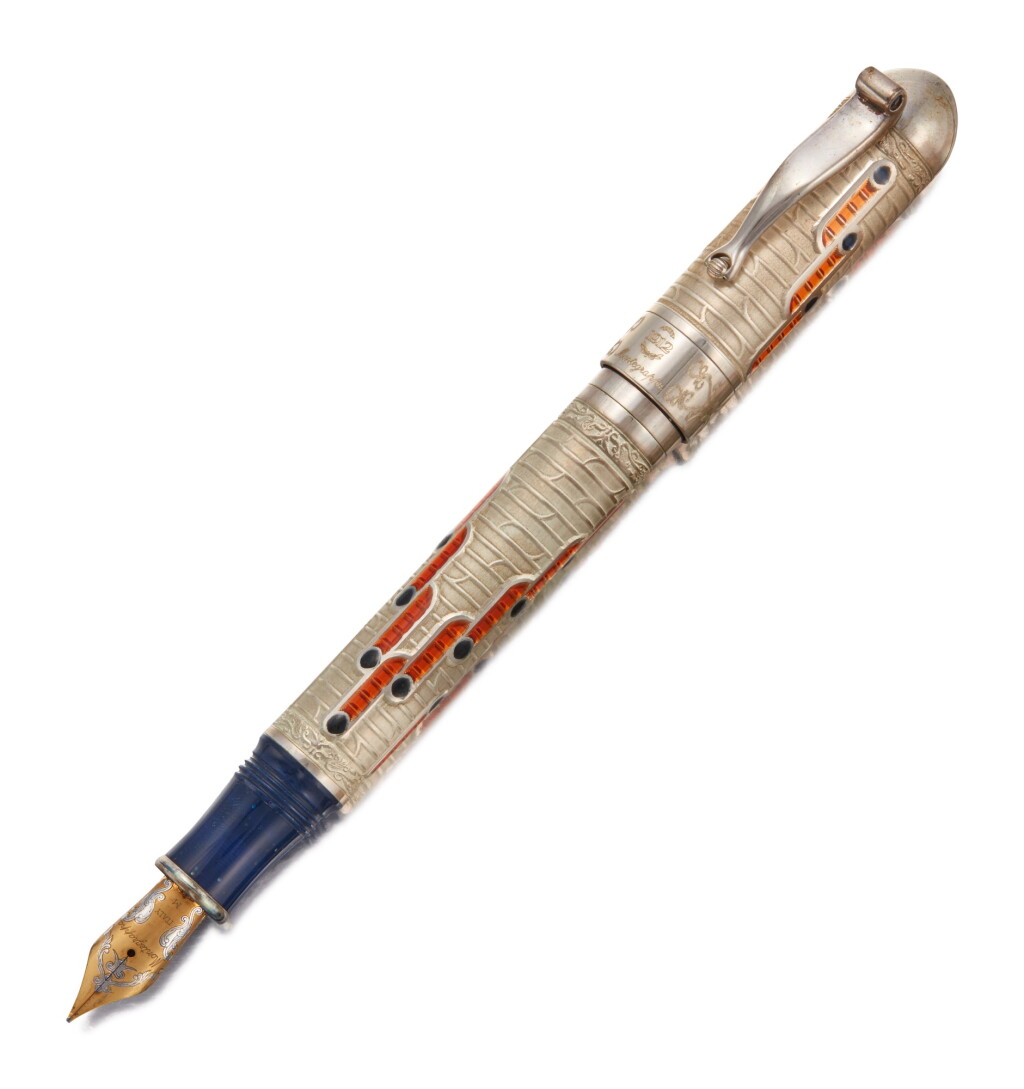 View full screen - View 1 of Lot 29. MONTEGRAPPA | A LIMITED EDITION STERLING SILVER FOUNTAIN PEN WITH ORANGE AND BLUE ENAMEL, CIRCA 2000.
