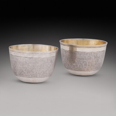 View full screen - View 1 of Lot 417. A cased pair of French parcel-gilt silver nesting beakers, Johannes Daniel Ott (Jean-Daniel Ott), Strasburg (Strasbourg), circa 1720.