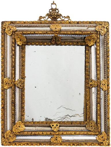 View full screen - View 1 of Lot 57. An Italian repoussé gilt-metal and gilt-bronze mounted glass mirror, Venice, late 17th/early 18th century.