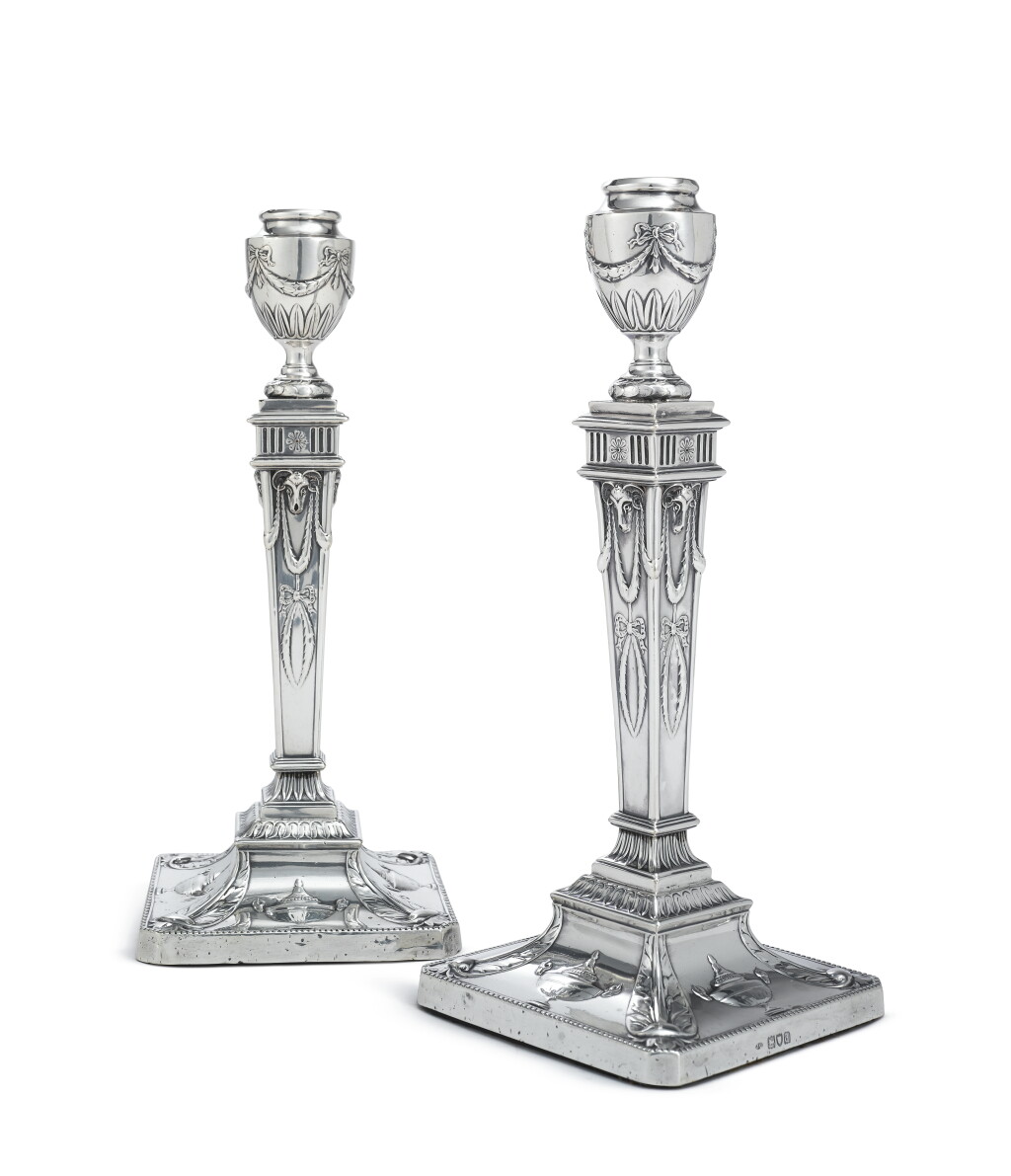 View full screen - View 1 of Lot 389. A Pair of Victorian Silver Candlesticks, Maker's Mark J.G in Oval, London, 1899.
