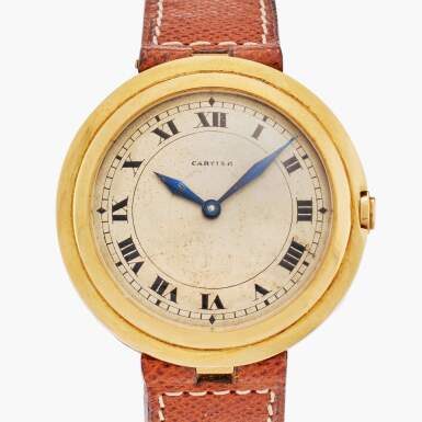 View full screen - View 1 of Lot 20. Ronde à Escalier | New York retailed: A rare and elegant 18ct yellow gold circular wristwatch with stepped bezel, t-bar lugs and gold deployant buckle, Circa 1945.