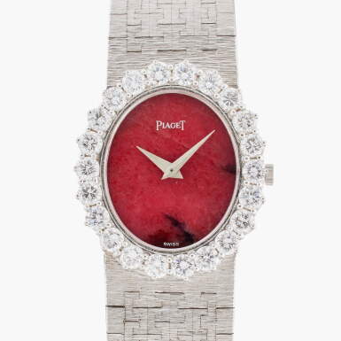 View full screen - View 1 of Lot 526. Reference 9338 A6 | A white gold and diamond-set bracelet watch with red jasper dial, Circa 1975.