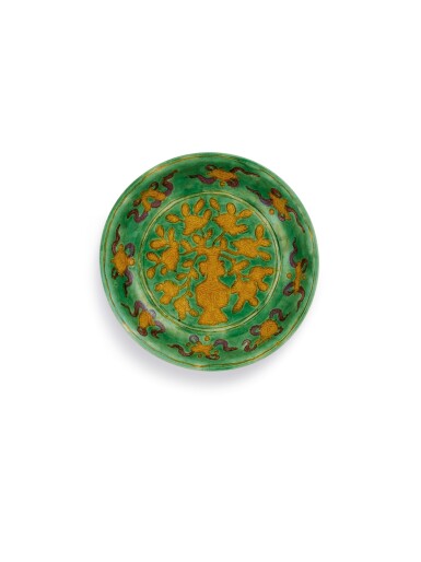 View full screen - View 1 of Lot 3626. An extremely rare green-ground sancai dish, Mark and period of Wanli | 明萬曆 綠地素三彩八寶靈芝紋撇口盤 《大明萬曆年製》款.