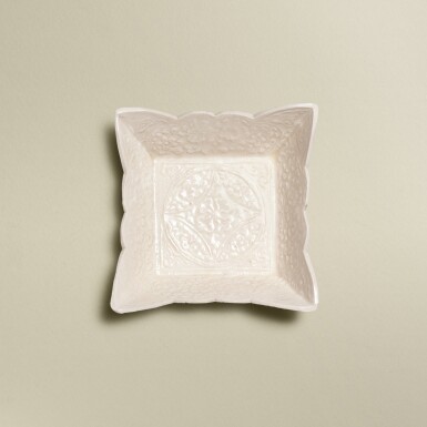 View full screen - View 1 of Lot 5743. A Dingyao white-glazed moulded foliate 'floral' dish, Northern Song dynasty | 北宋 定窰白釉印花卉紋方盤.