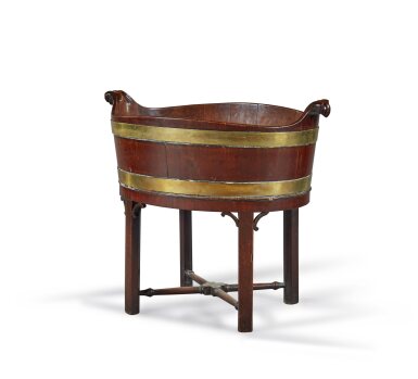 View full screen - View 1 of Lot 133. An early George III brass-bound mahogany wine cooler-on-stand, circa 1760.
