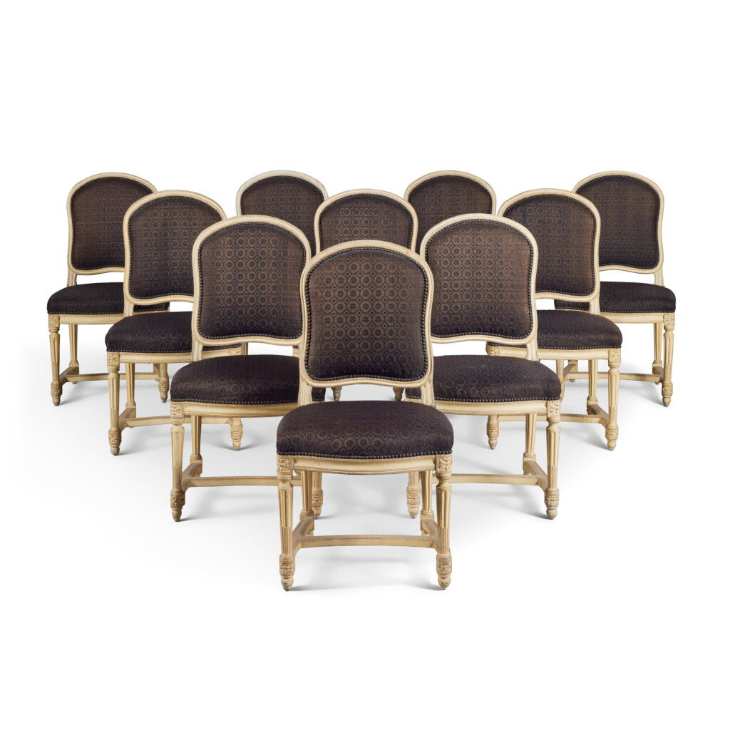 View full screen - View 1 of Lot 707. A Set of Ten Louis XVI Ivory-Painted Dining Chairs, Late 18th Century.