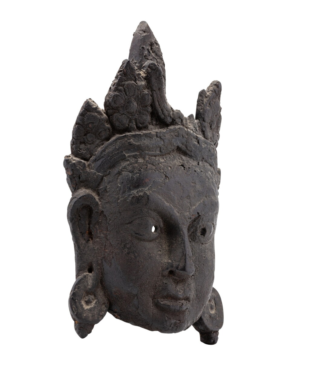 View full screen - View 1 of Lot 164. A carved wood mask of a bodhisattva Nepal, Newar, Katmandou valley, 17th century | 尼泊爾 加德滿都紐瓦爾 十七世紀 木雕菩薩面具.
