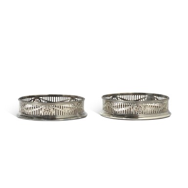 View full screen - View 1 of Lot 128. A Pair of George III Silver Wine Coasters, William Plumber, London, 1776.