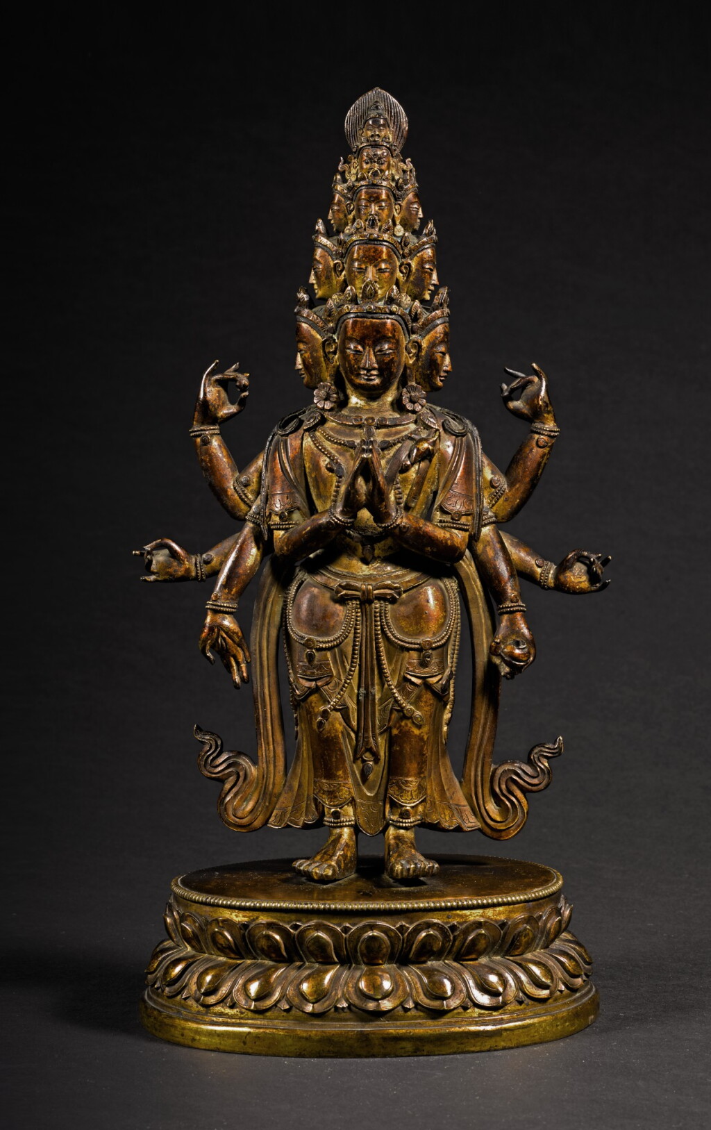 View full screen - View 1 of Lot 186. A GILT-BRONZE FIGURE OF ELEVEN-HEADED AVALOKITESHVARA QING DYNASTY, 18TH CENTURY | 清十八世紀 鎏金銅十一面觀音立像.