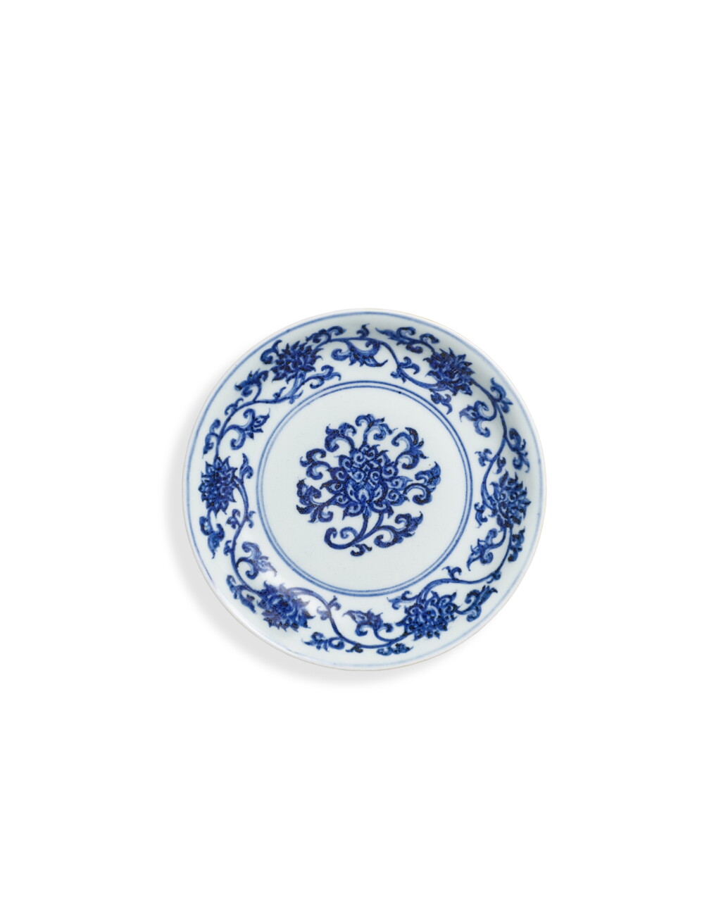 View full screen - View 1 of Lot 5042. A rare blue and white 'lotus' dish, Mark and period of Xuande | 明宣德 青花番蓮紋盤 《大明宣德年製》款.