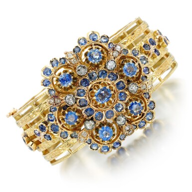 View full screen - View 1 of Lot 162. Sapphire and diamond bangle.