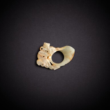 View full screen - View 1 of Lot 7885. A pale celadon jade 'tiger and bird' archer's ring, Han dynasty | 漢 青白玉虎鳥紋韘形珮.