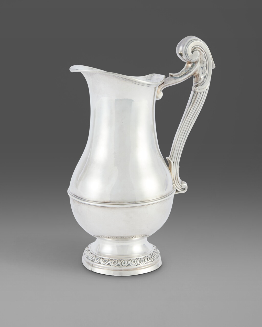 View full screen - View 1 of Lot 611. A Louis XV Provincial Silver Ewer, Maker's Mark IF/S, Second Quarter 18th Century.