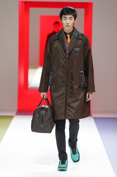 View full screen - View 1 of Lot 63. PRADA | RE-NYLON COAT, RE-NYLON BAG, WORN BY SHAOQI ZENG. UNIQUE BAG, NOT IN THE STORES.