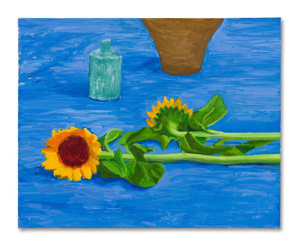 View full screen - View 1 of Lot 13. Two Sunflowers Laying on a Table.