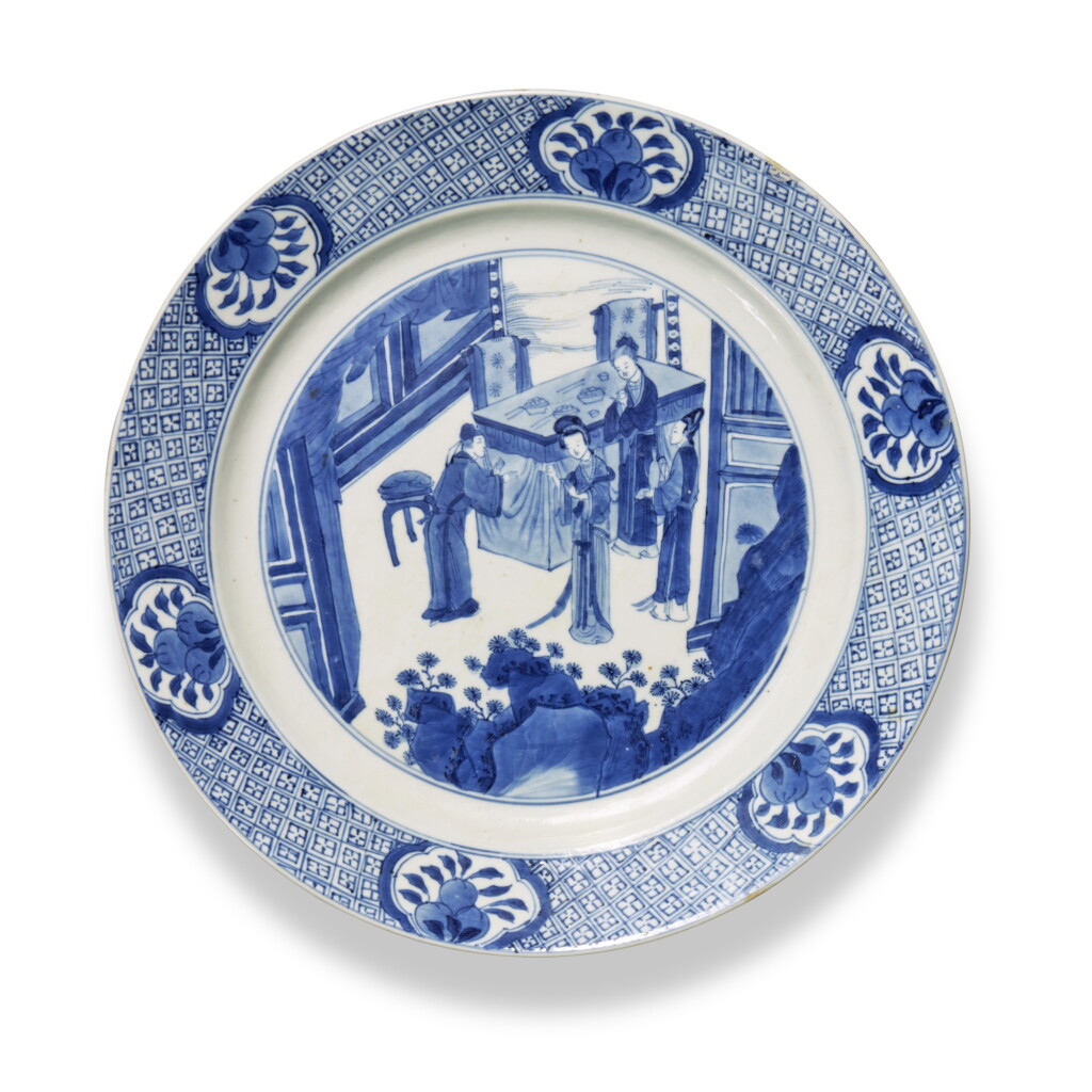 View full screen - View 1 of Lot 917. A blue and white 'ladies' dish, Mark and period of Kangxi | 清康熙 青花人物故事圖盤 《大清康熙年製》款.