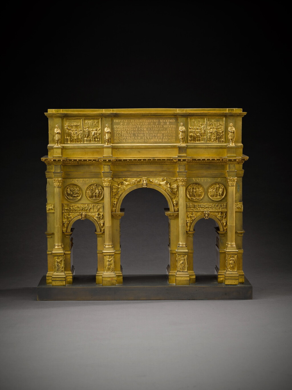 View full screen - View 1 of Lot 42. An Italian gilt-bronze model of the Arch of Constantine, circa 1820, attributed to Wilhelm Hopfgarten and Ludwig Jollage.