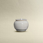 A small qingbai-glazed jar and cover, Song dynasty | 宋 青白連蓋小罐