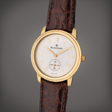View full screen - View 1 of Lot 444. Leman | A yellow gold wristwatch, Circa 2002.